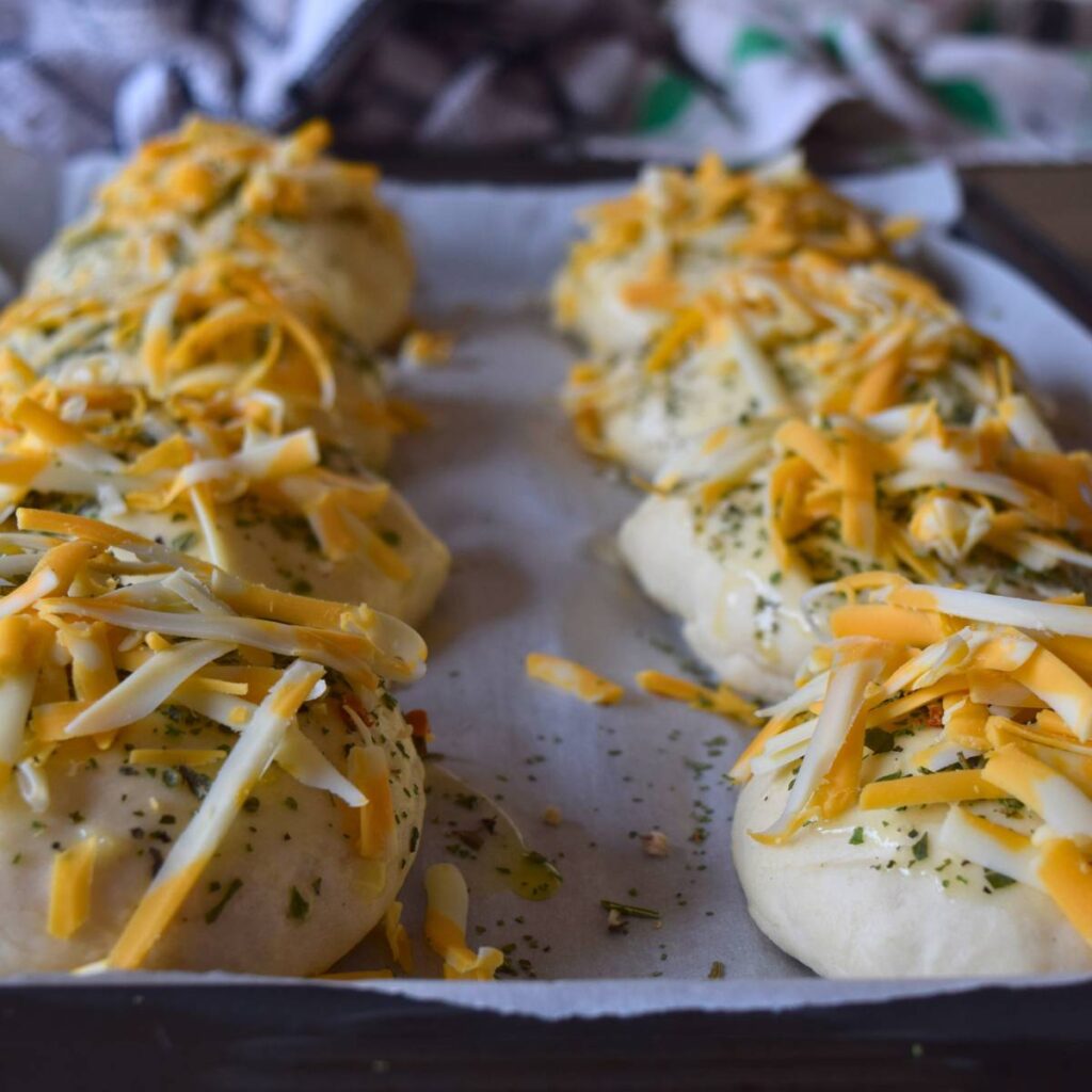 Super Simple Cheesy Buns right before going in the oven.