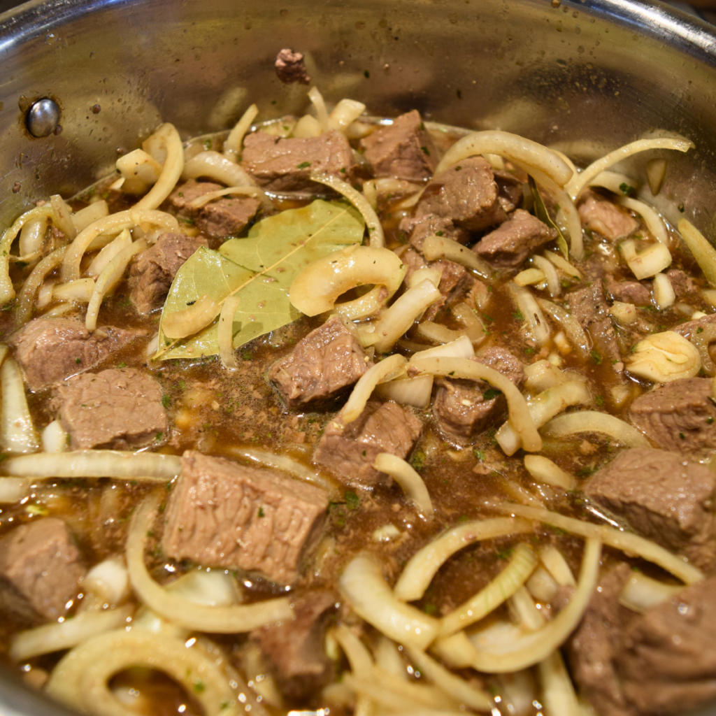 Easy and Delicious Beef Stew All Ingredients In Pot Ready to Stew